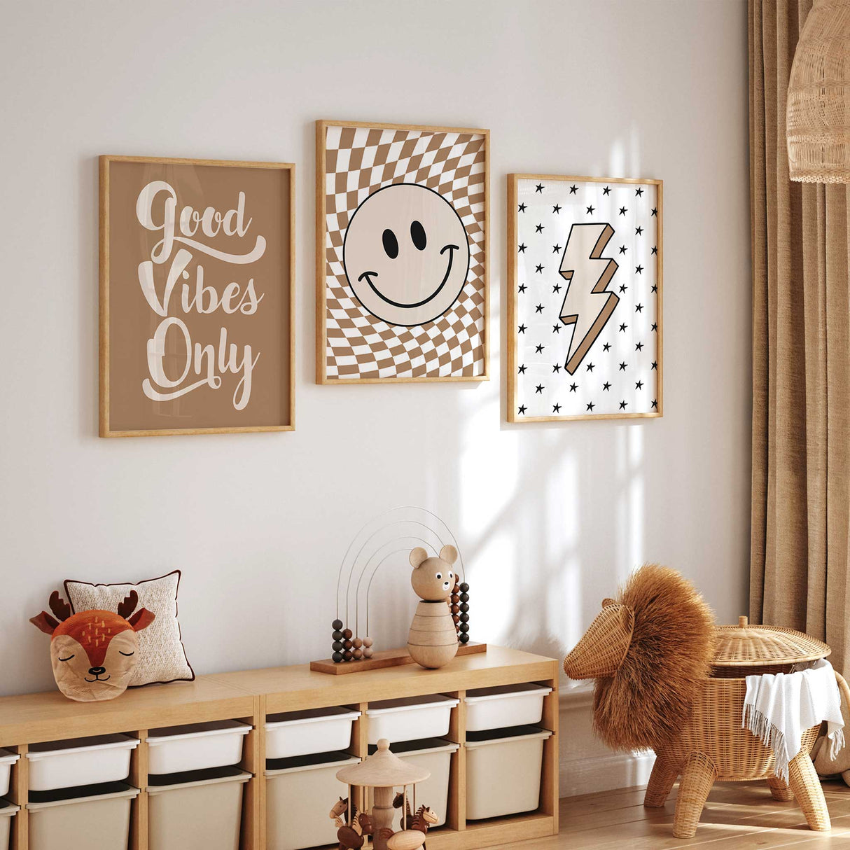 Three coordinating neutral kids prints featuring a lightning bolt, Good Vibes typography and checkerboard smiley face