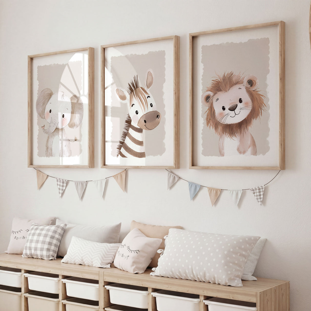 Neutral safari nursery wall art set of three featuring a lion, zebra and elephant in soft beige and brown tones.