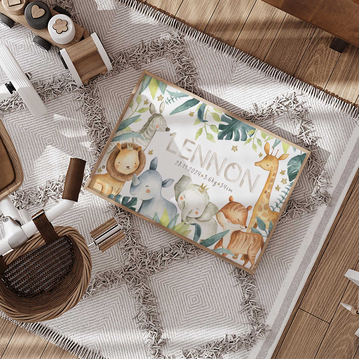 Neutral safari birth details print featuring the baby’s name, date, weight and length with jungle animals and leaves