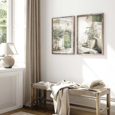 Framed photography print of olive tree in weathered wooden planter against textured wall