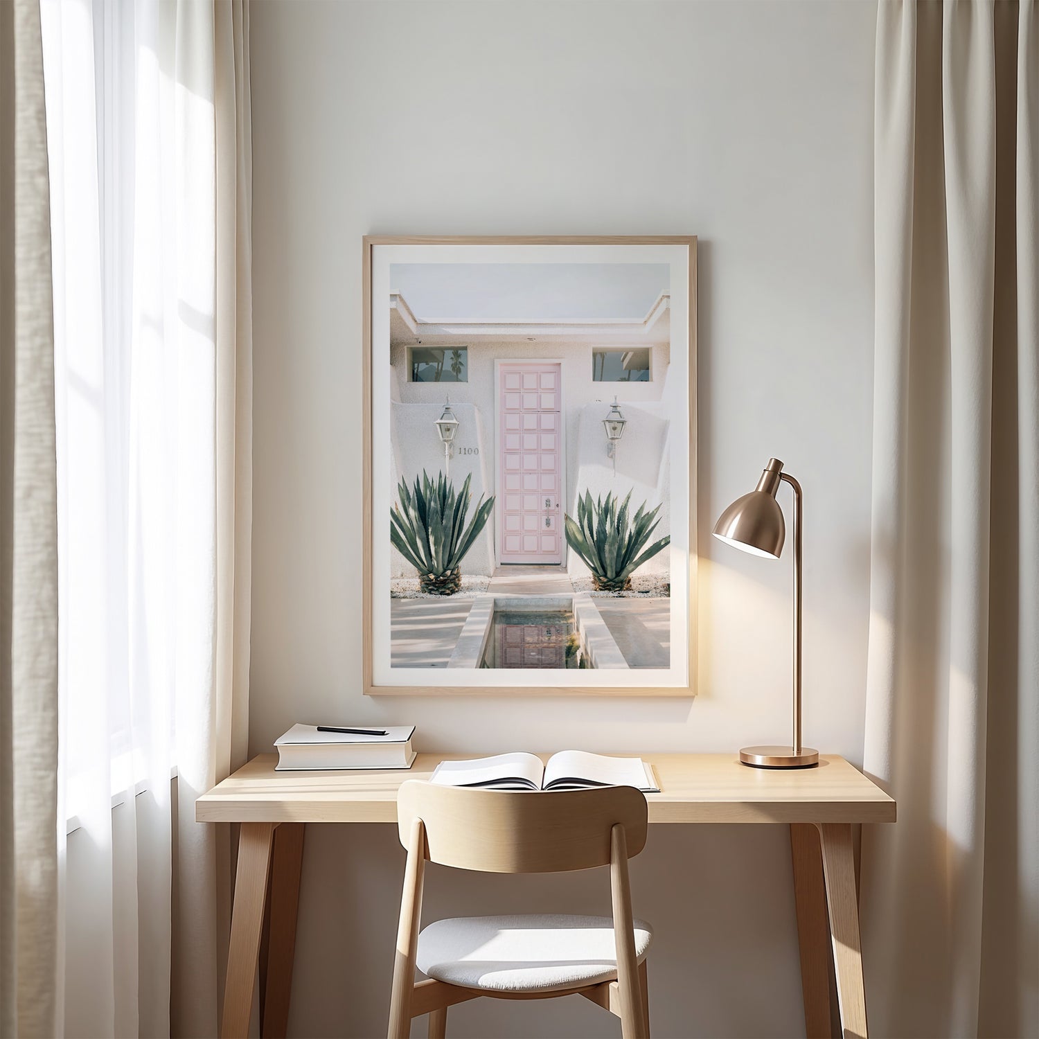 Palm Springs retro pastel pink door wall art print with agave plants and white border for framing.