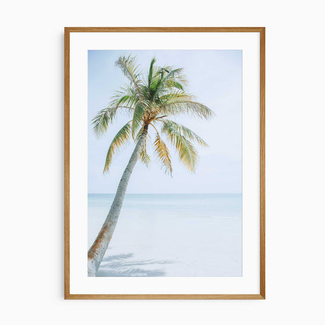 Palm tree beach wall art print with tropical ocean and soft sandy shore