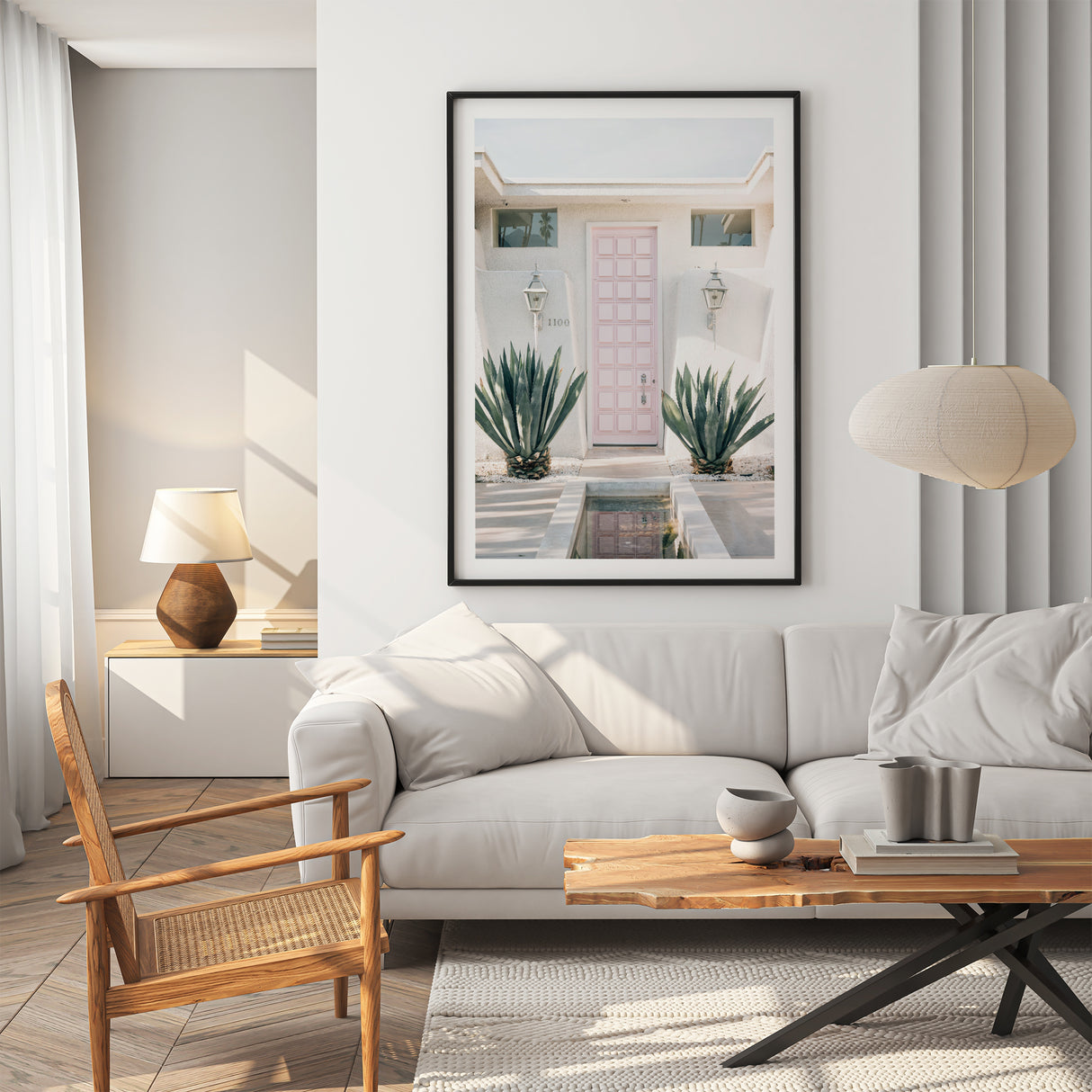 Pastel architecture photography wall art print of Palm Springs mid-century home with pink door and white border.