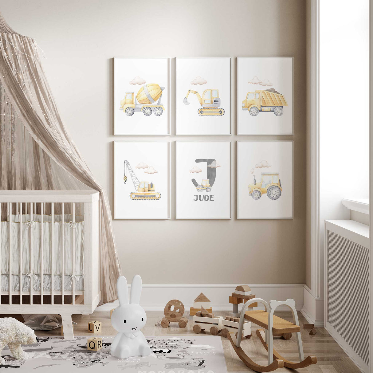 Personalised construction nursery wall art set featuring cement mixer, digger, dump truck, crane, tractor and custom initial name print in soft yellow and grey tones