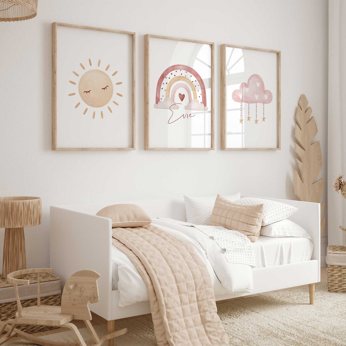 Boho nursery wall art in soft pink with rainbow, sun and cloud prints