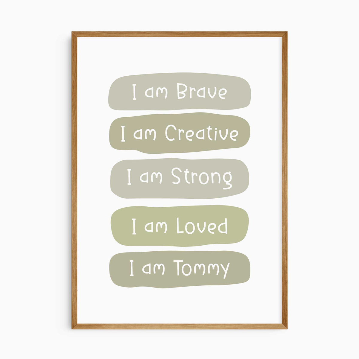 Green affirmation print with white lettering reading I am Brave, Creative, Strong and Loved, ending with I am and name