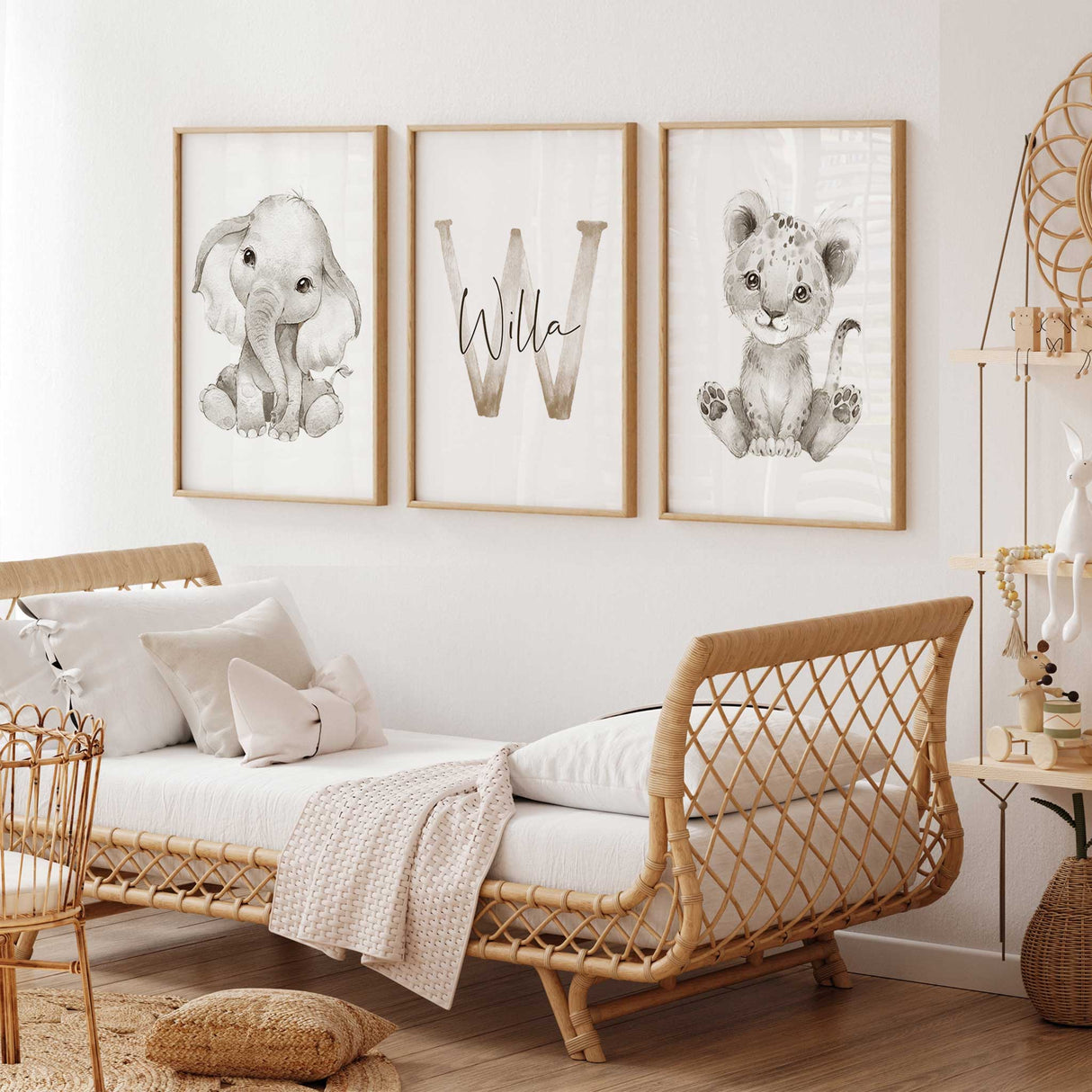 Personalised safari nursery wall art set with baby elephant, lion cub and custom initial name print in soft neutral tones