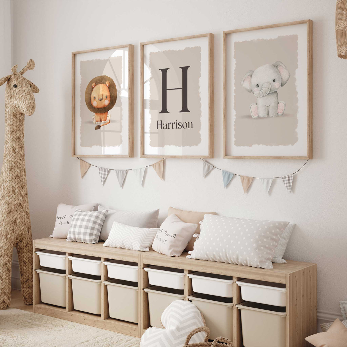 Baby room safari-themed wall art set with lion, elephant, and name personalisation in neutral colours.
