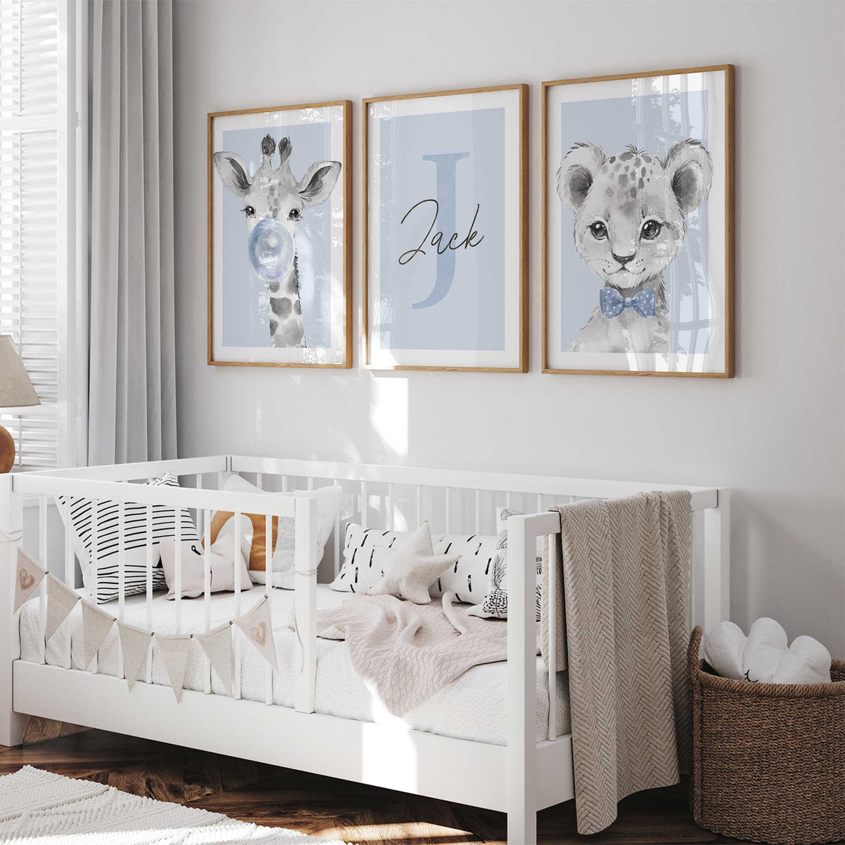 personalised baby boy safari nursery wall art set with giraffe initial and lion illustrations