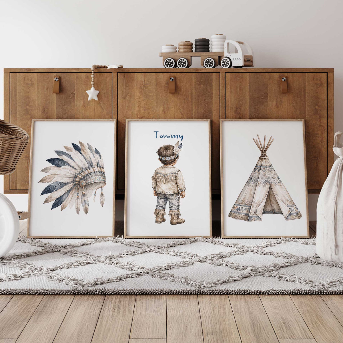 Personalised tribal nursery print set of three featuring a feather headdress, named little boy and patterned teepee.