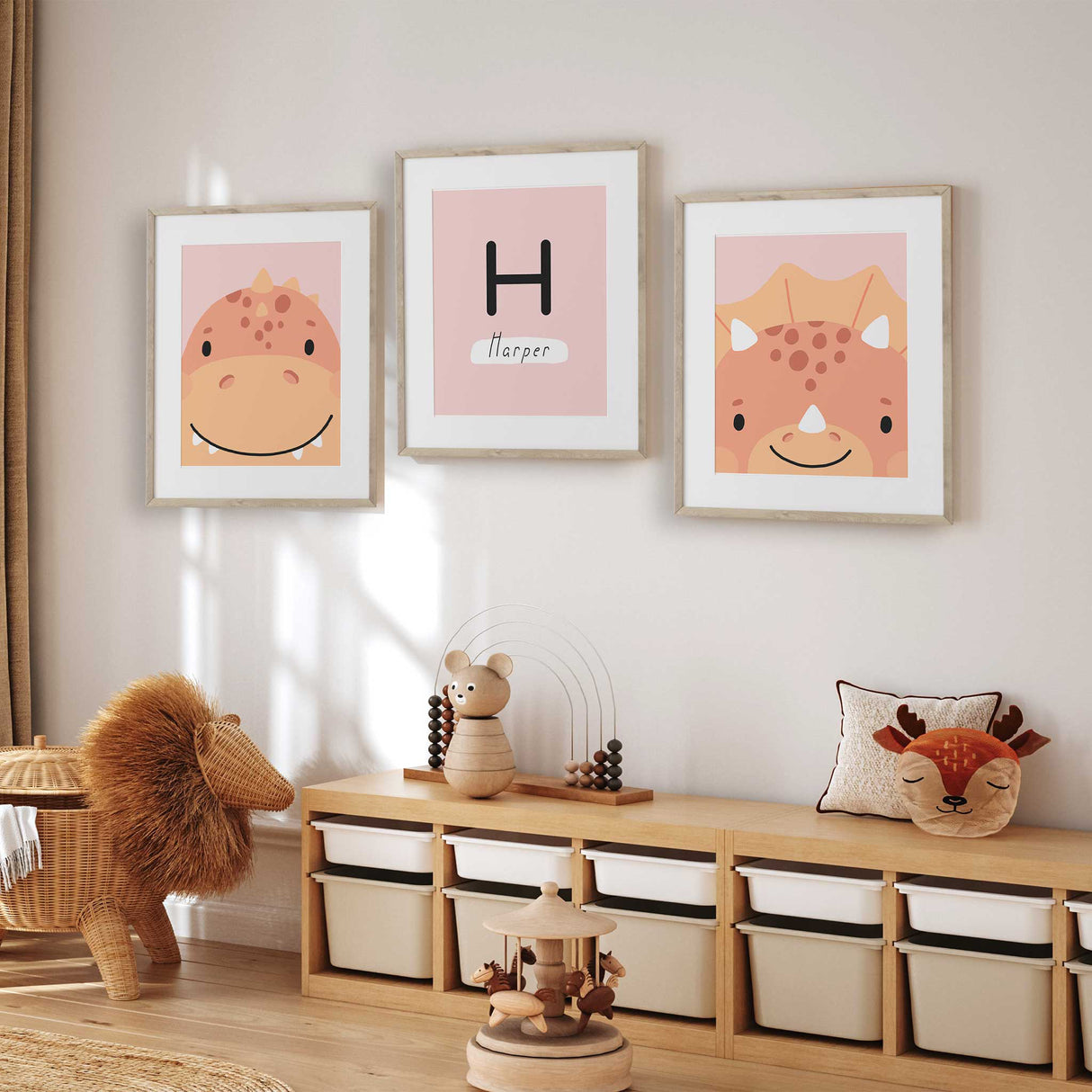 Pink illustrated dinosaur wall print in soft blush and coral colours for a young girl’s bedroom or playroom