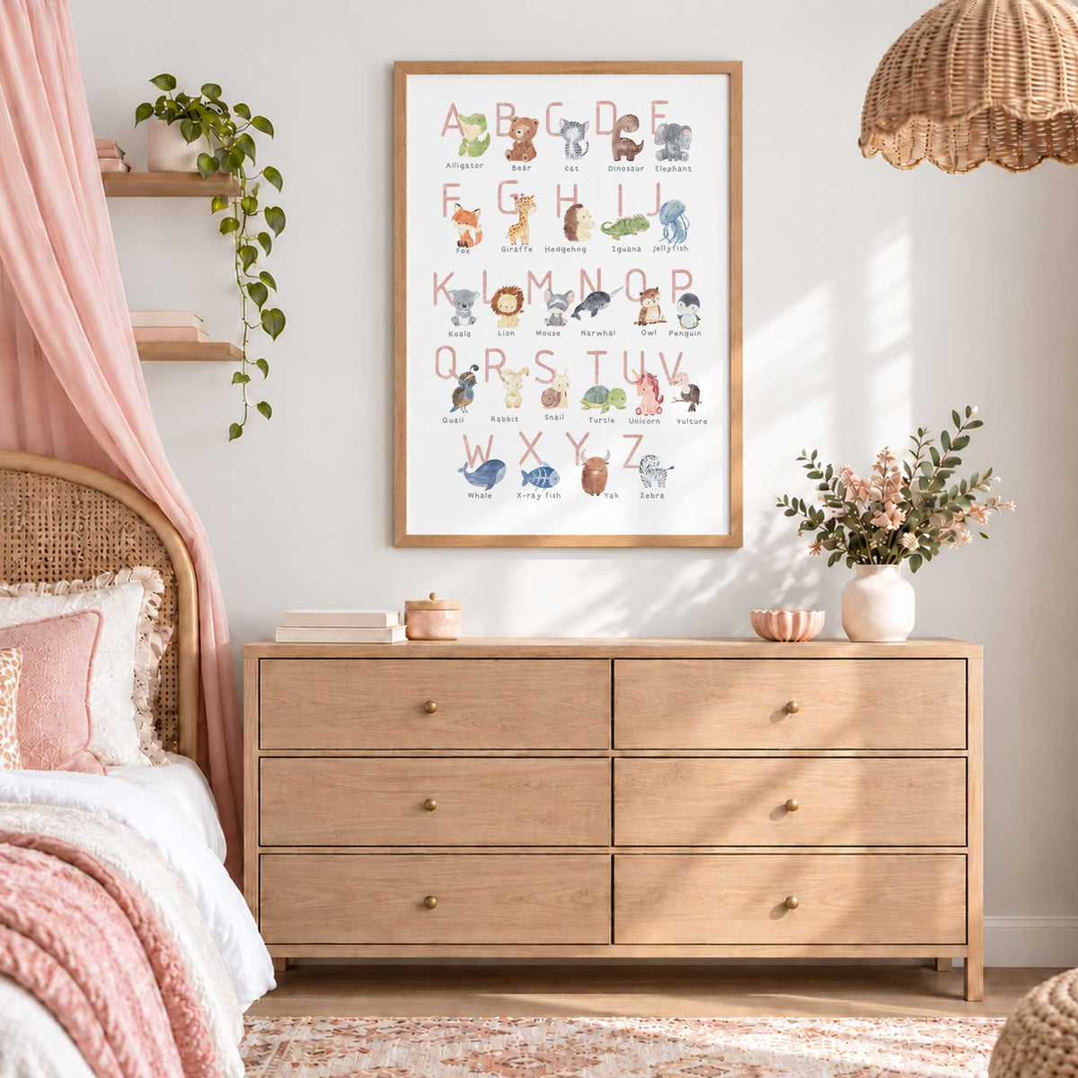 Animal alphabet print with pink A to Z letters and named watercolour illustrations, including a bear and unicorn.