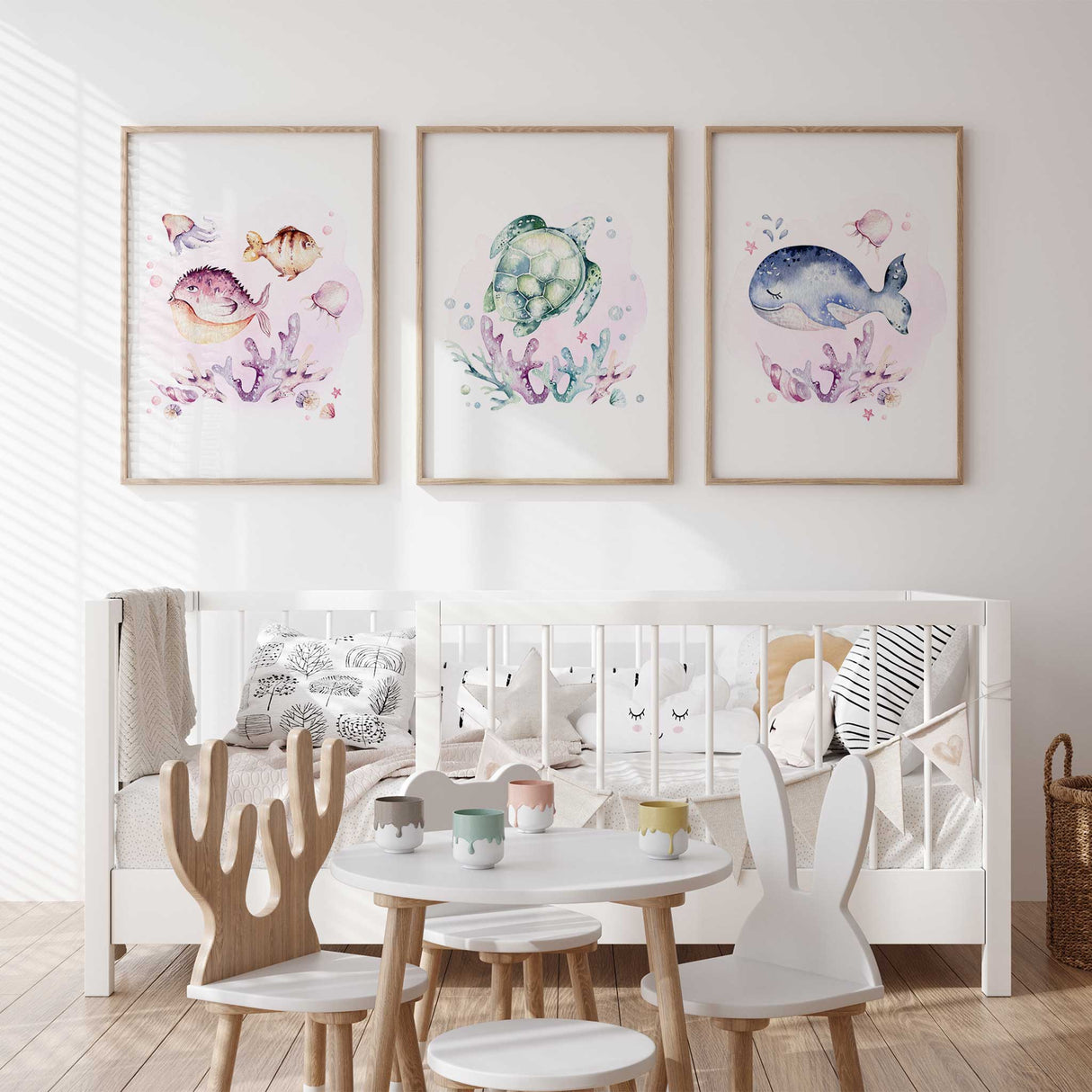 Pink ocean animal nursery prints with turtle, whale, and coral, ideal for girls coastal nursery wall art.