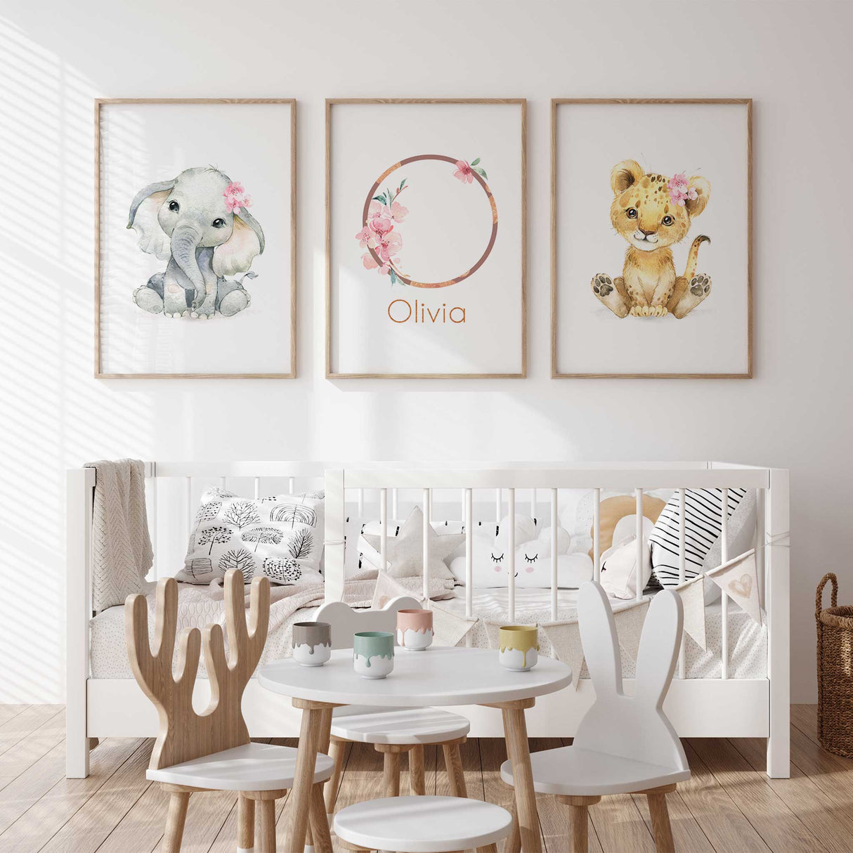 Pink safari wall art set for a girl nursery with elephant personalised wreath print and lion