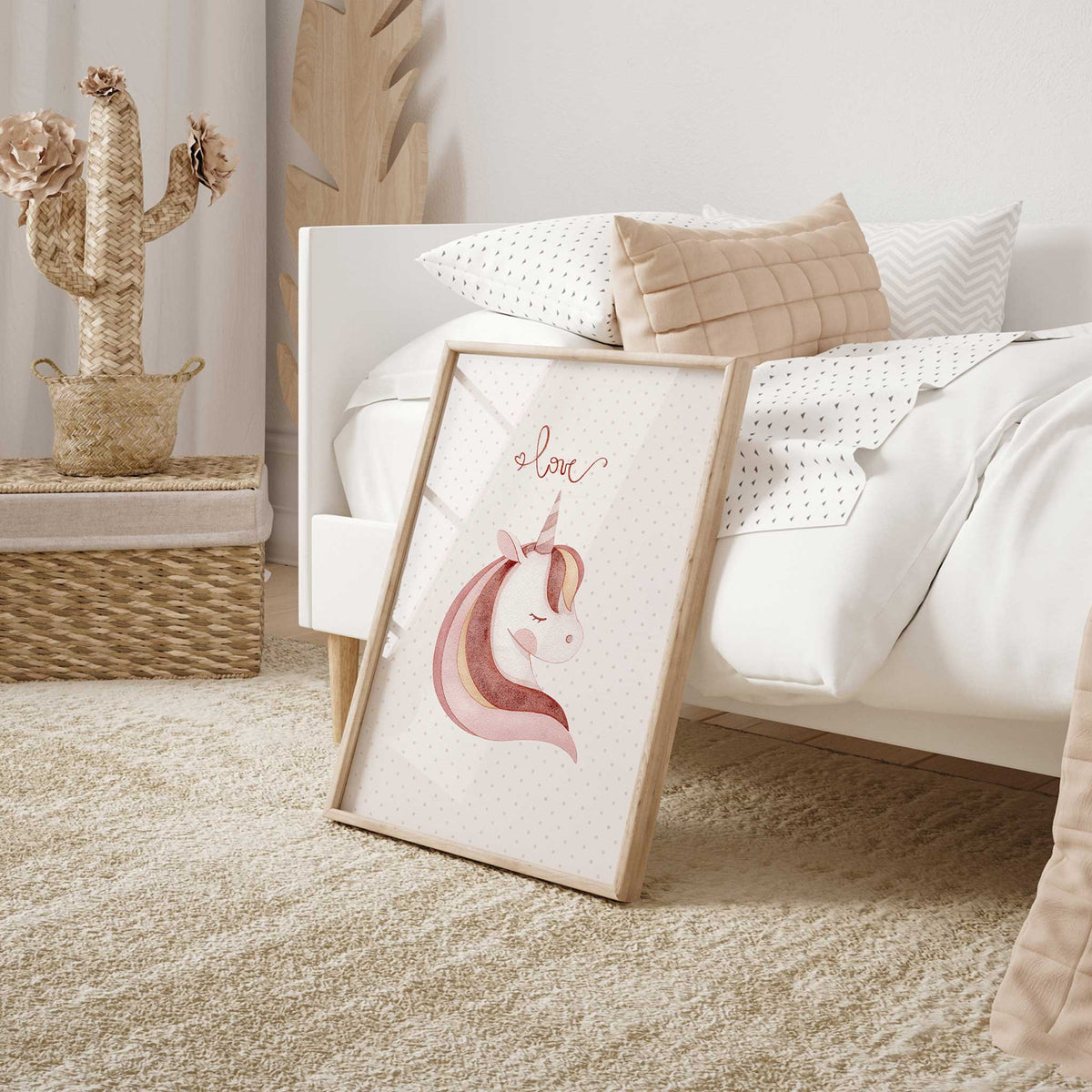 Soft pink unicorn wall art with blush and neutral tones and delicate love script above the illustrated unicorn