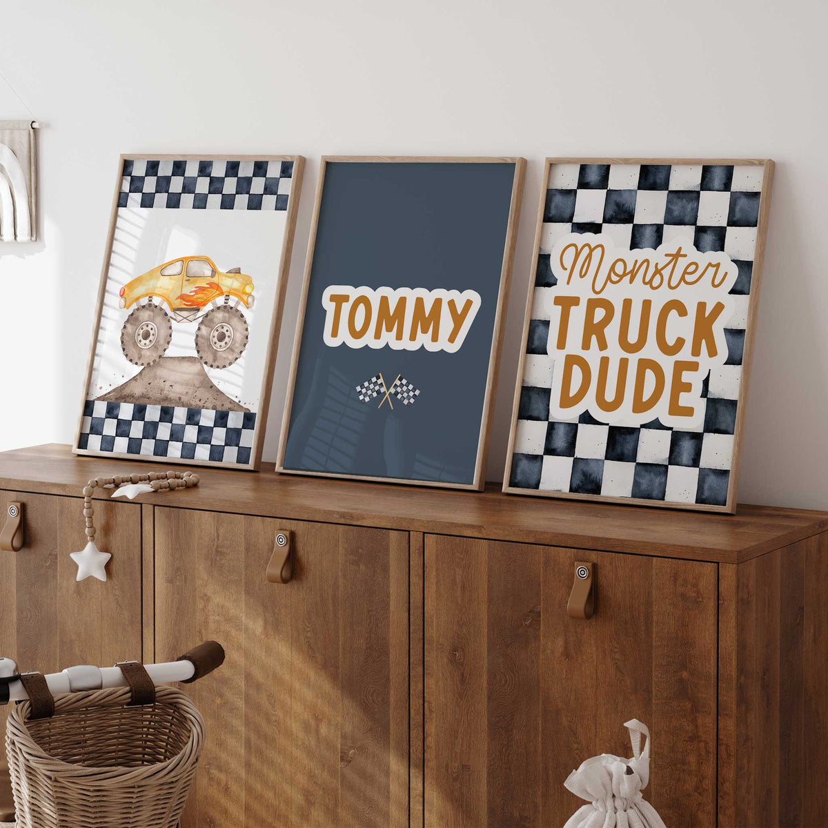 Set of three monster truck prints with checkered flag backgrounds, flames and a personalised name print