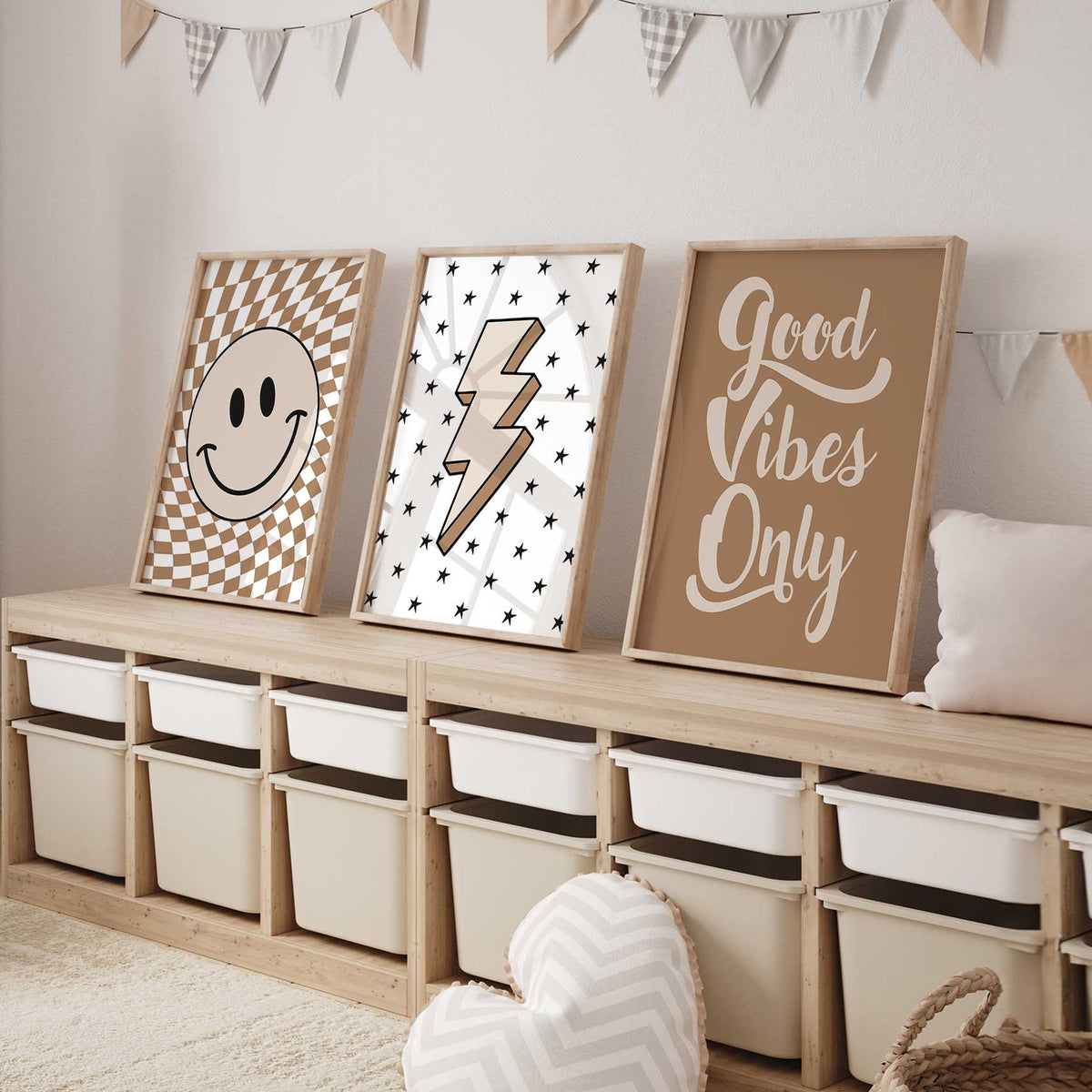 Set of three neutral retro wall art prints displayed above a bed in a modern boys bedroom