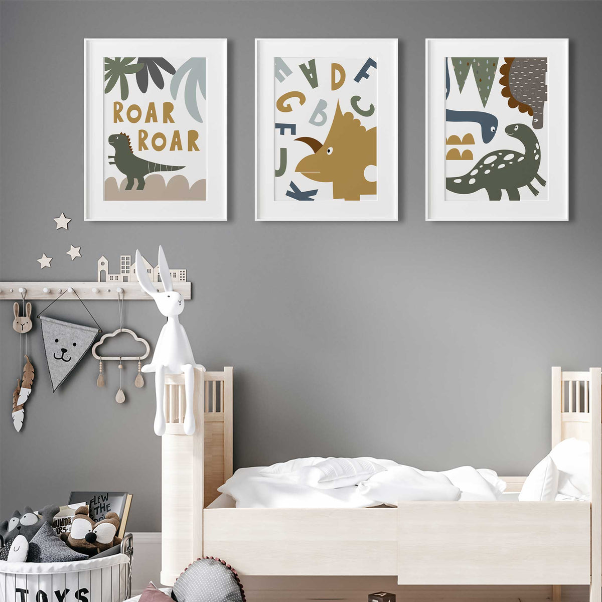Bold Roar Roar dinosaur artwork in earthy colours, part of a matching set of three kids room prints