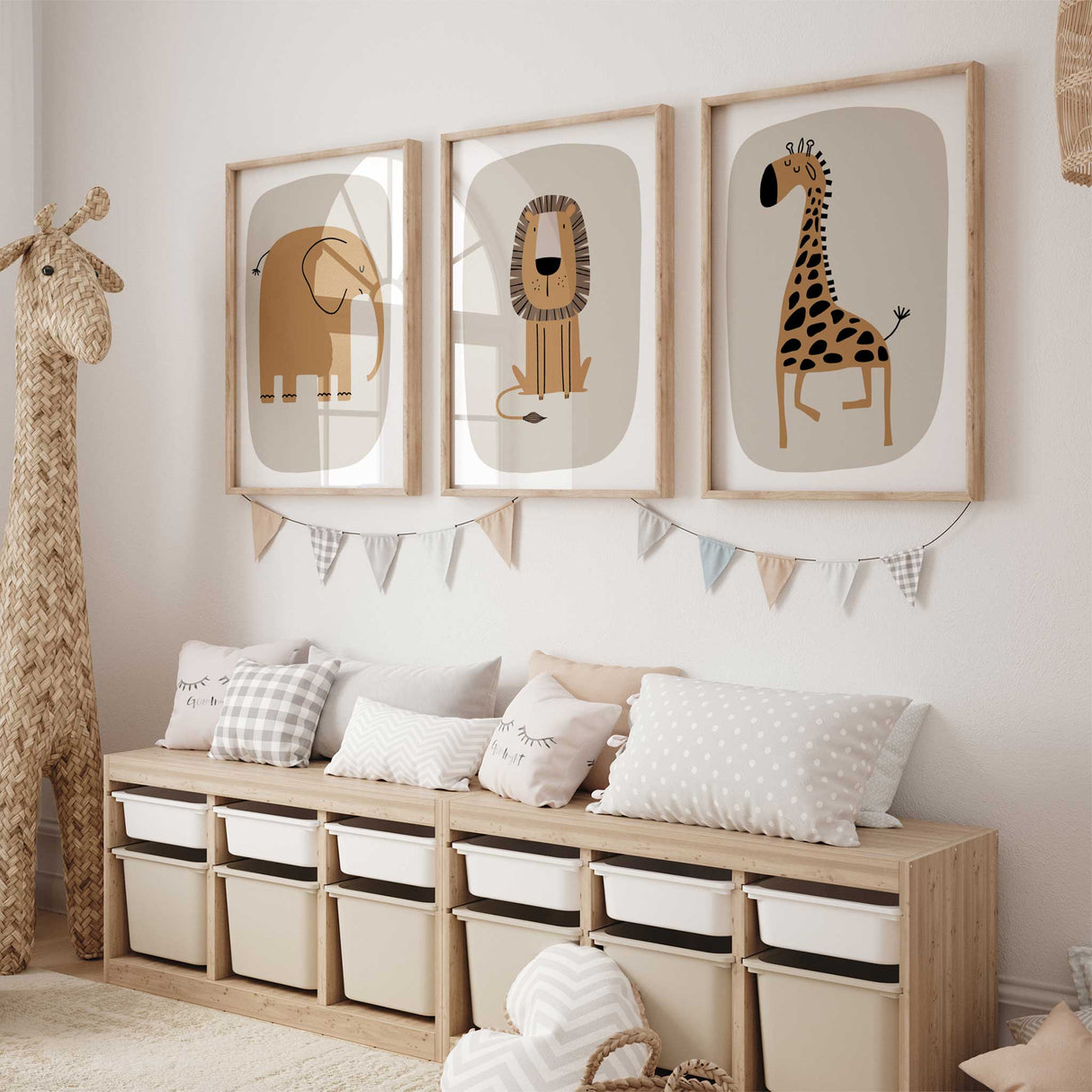 Elephant, giraffe, and lion nursery prints on neutral background - perfect for safari-themed kids' rooms.
