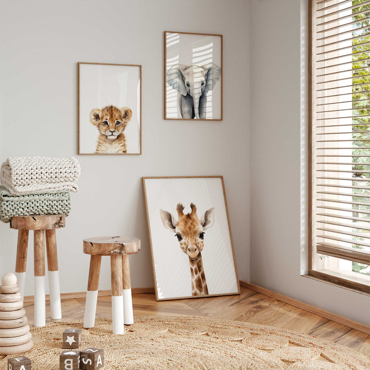 Safari-themed kids' room wall decor with framed baby animal prints to create a cohesive gallery wall.