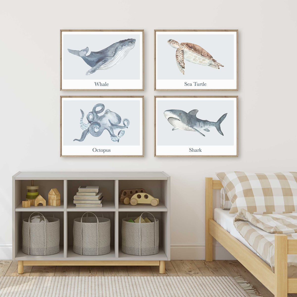 Four landscape sea animal prints featuring a whale, sea turtle, octopus and shark, with watercolour artwork and animal names.