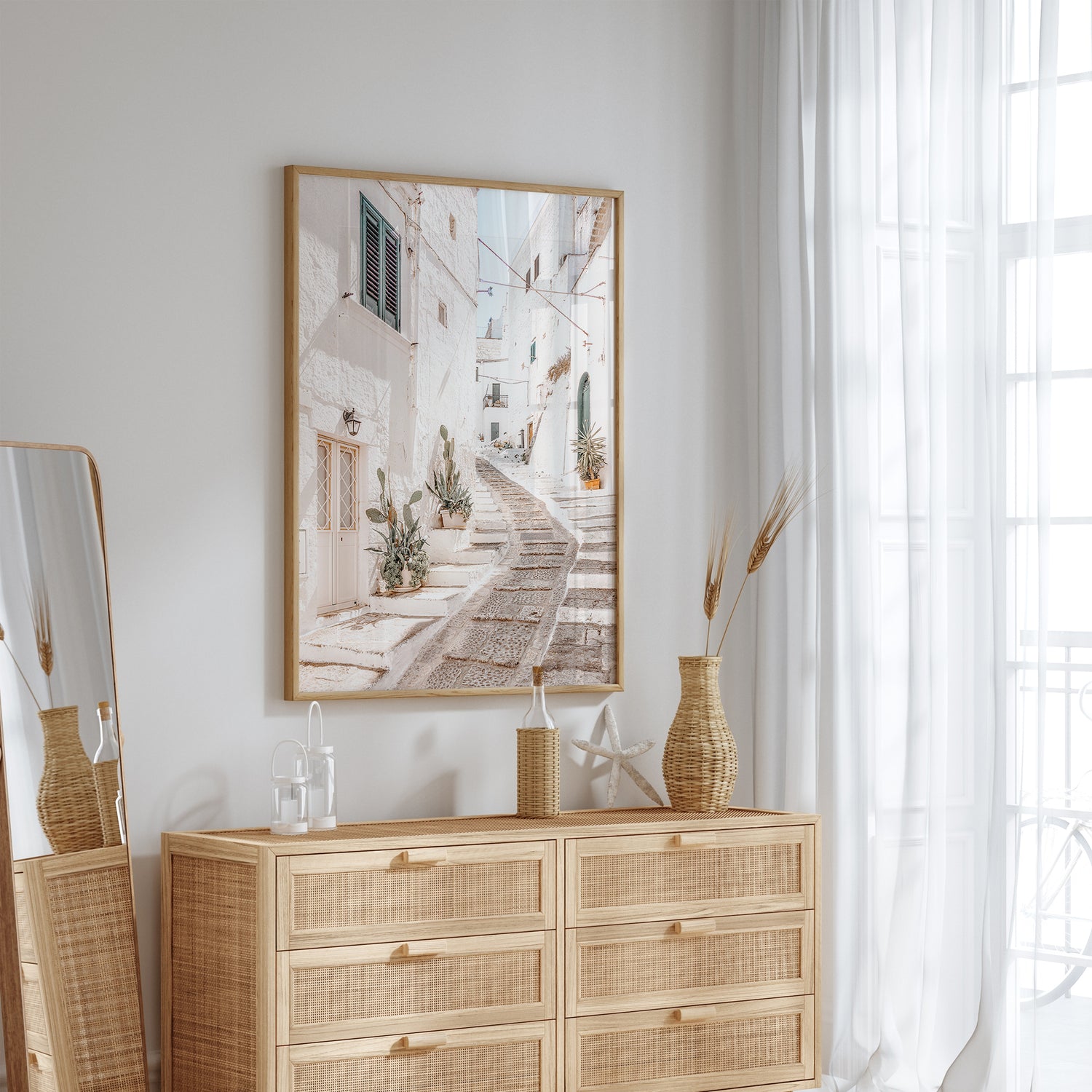 Southern Italy wall decor showing a scenic alleyway in Ostuni, Apulia with potted plants and sunlit walls.