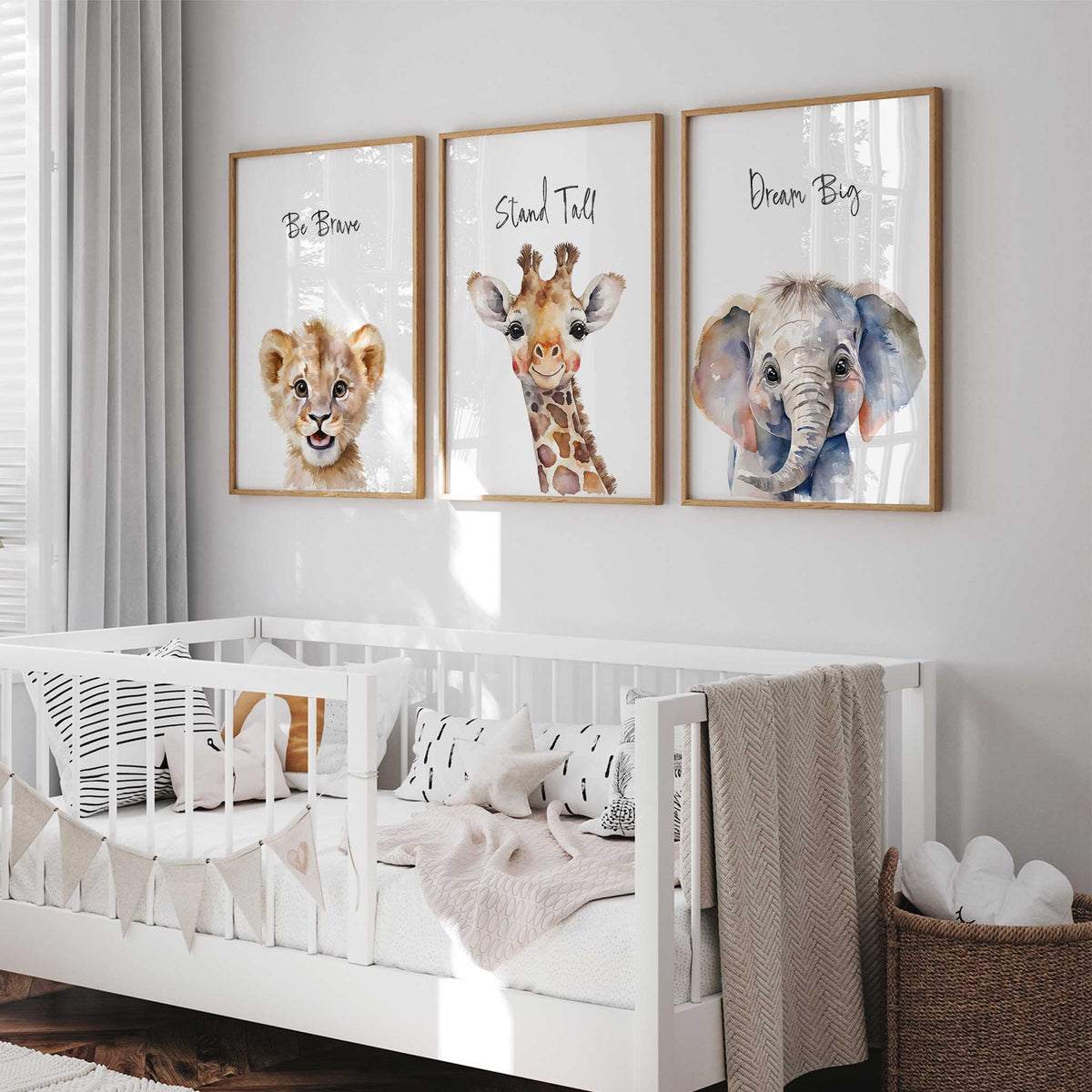 Three watercolour animal prints pairing a giraffe, elephant and lion cub with Stand Tall, Dream Big and Be Brave.