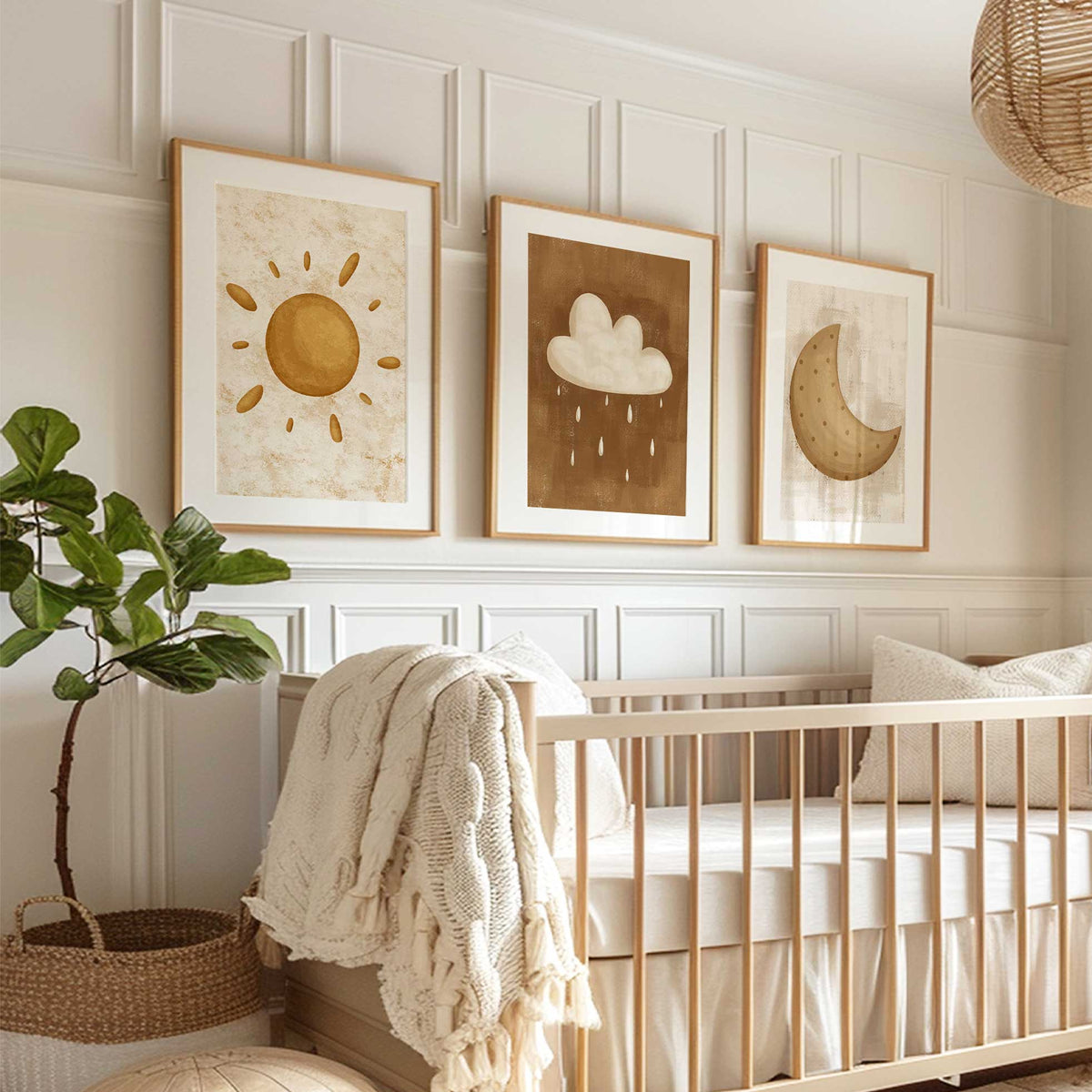 Sun moon cloud nursery prints set of three, featuring a golden sun, crescent moon and rain cloud in warm neutral tones.