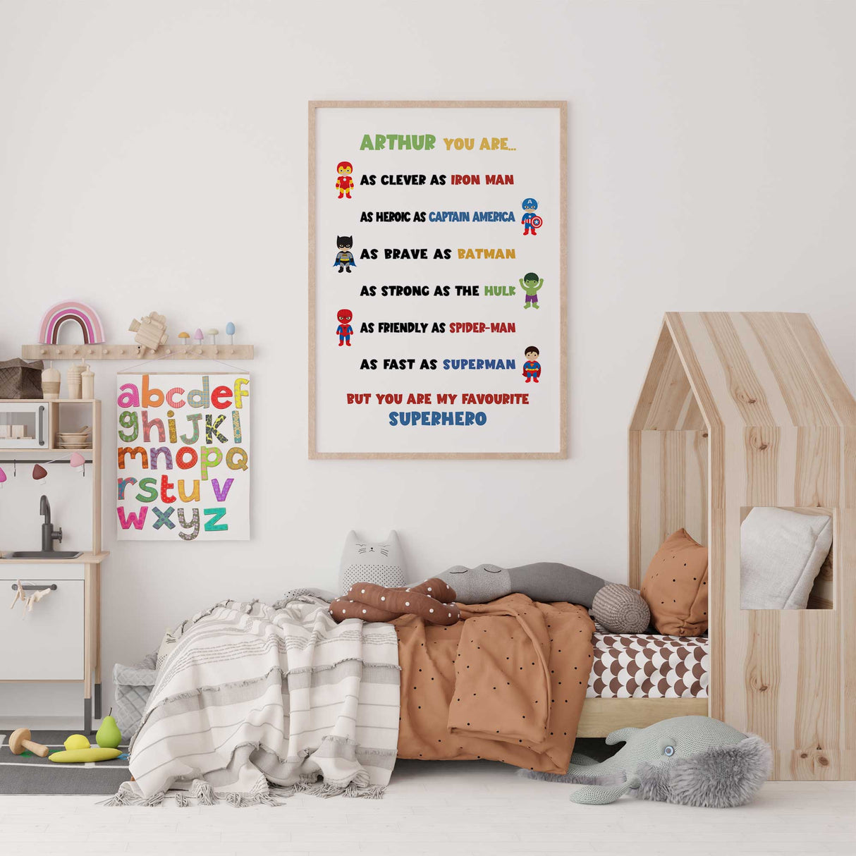 Superhero name print for kids featuring cartoon superhero characters and personalised wording