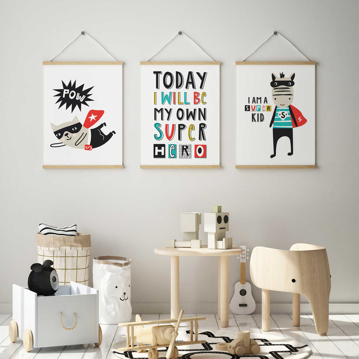 Matching superhero themed kids room décor prints designed as a cohesive set