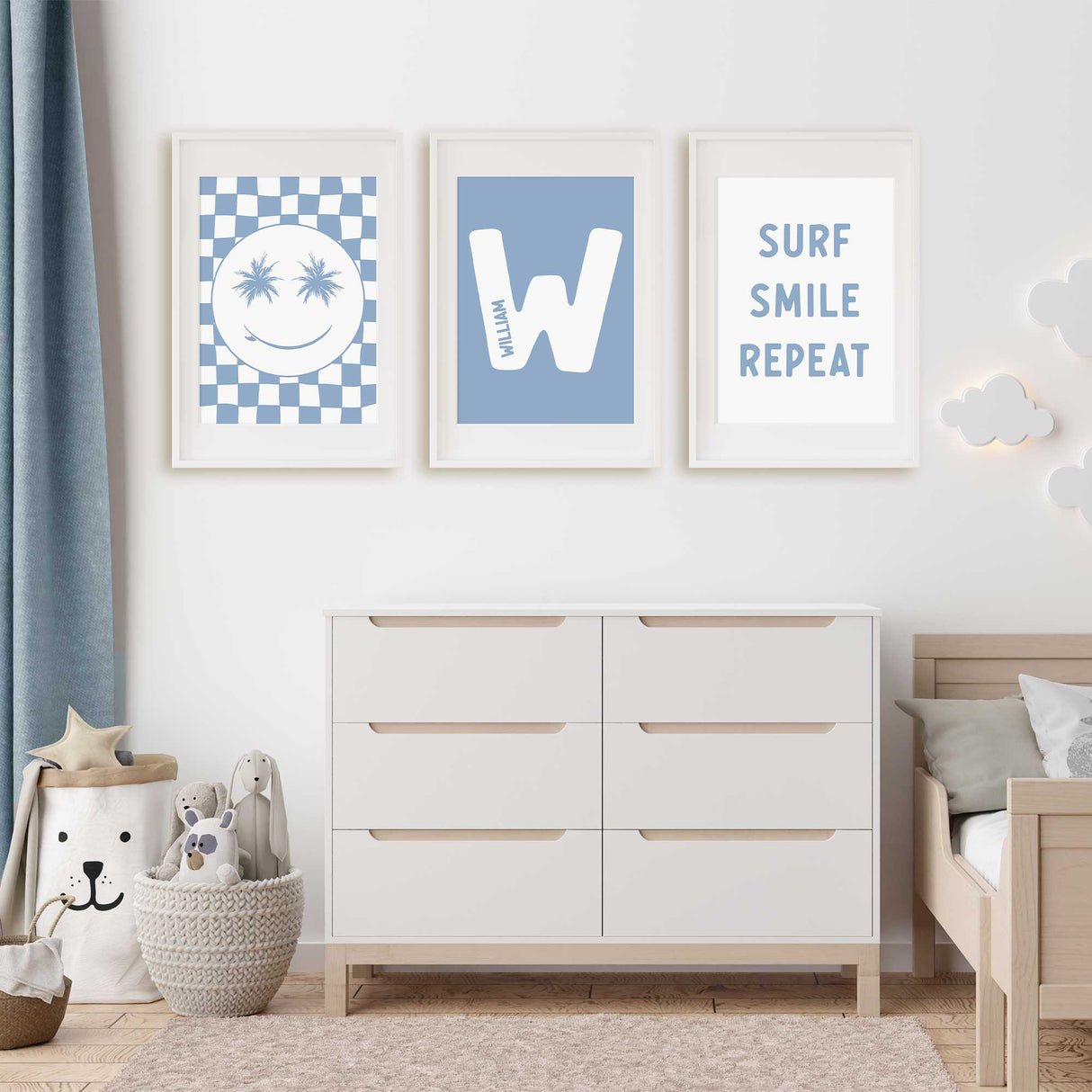 Blue surf toddler wall art trio with smile, palm tree, and personalised name prints for boys room decor