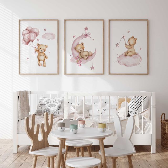 Cute teddy bear nursery print holding balloons, pastel pink baby room decor.