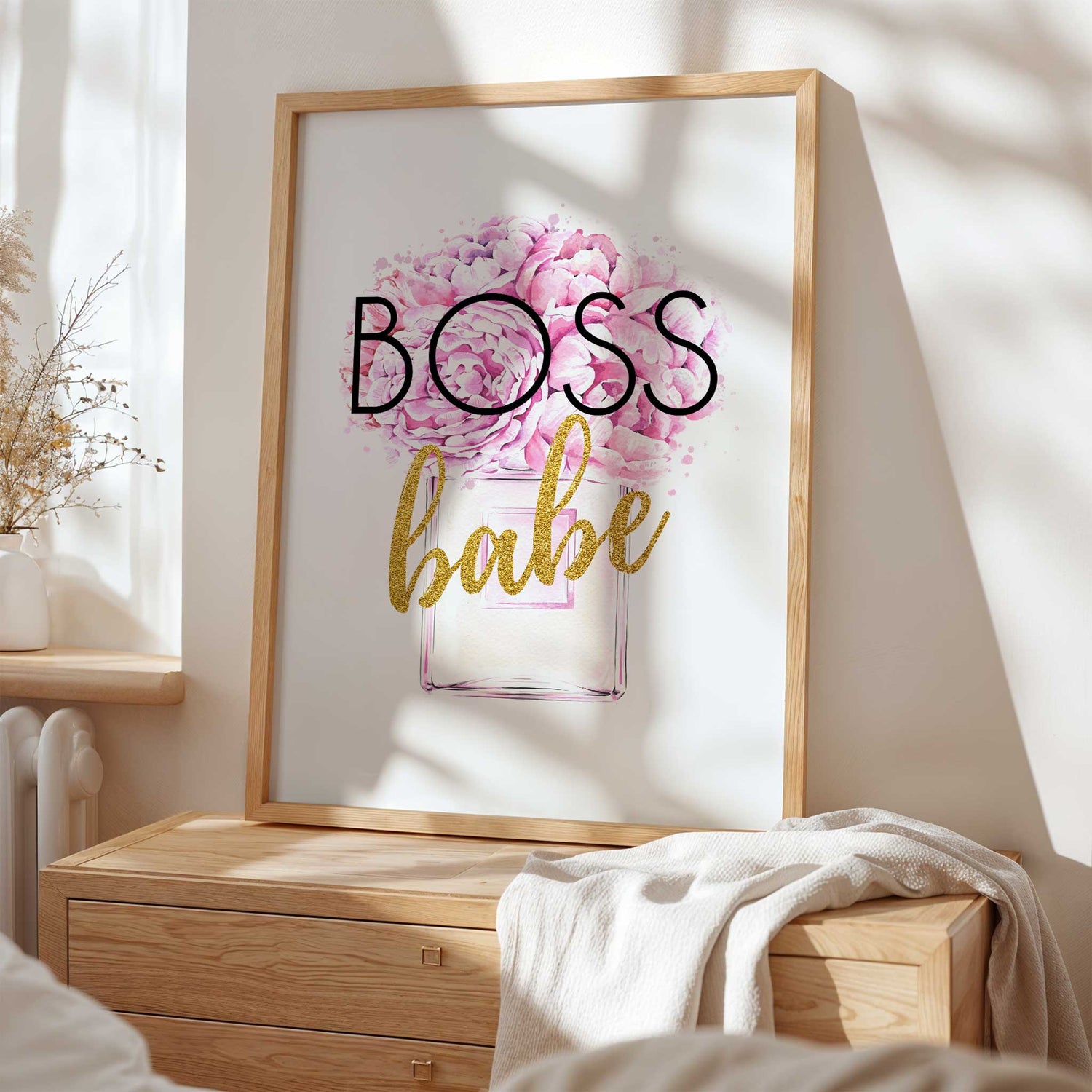 Chic perfume bottle wall art with pink peony flowers and empowering 'Boss Babe' text for stylish spaces.