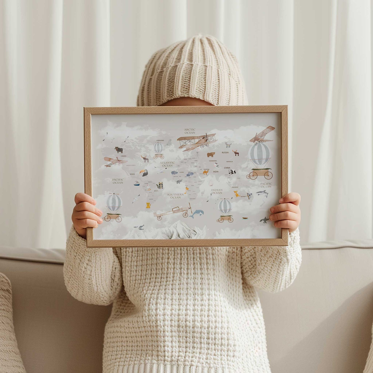 Illustrated adventure world map for kids featuring animals and whimsical designs