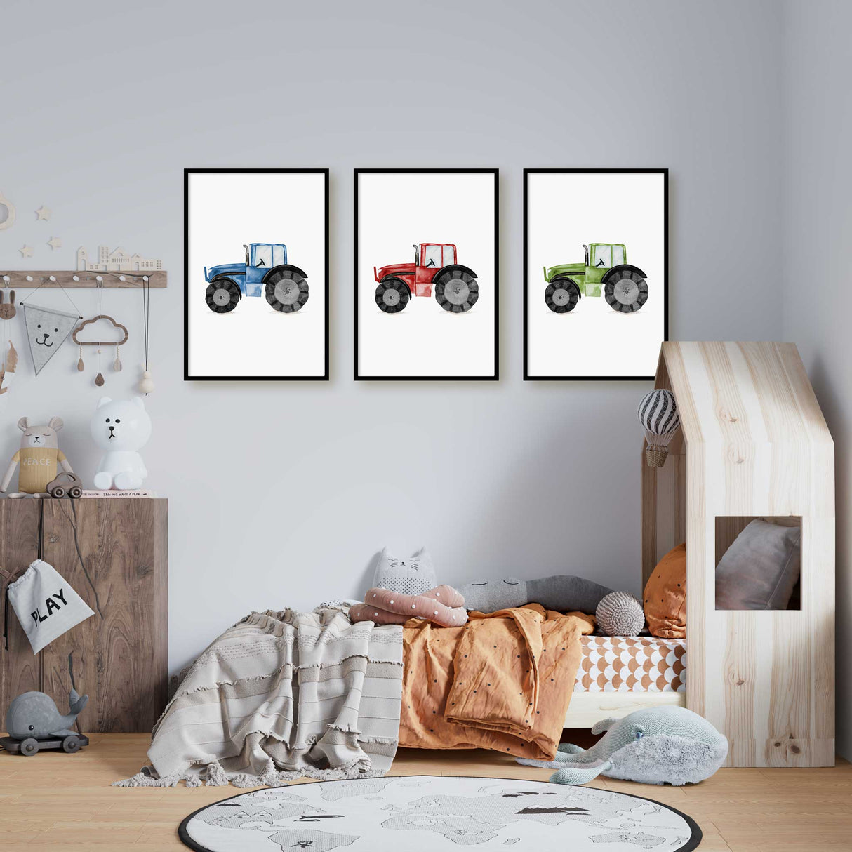 Tractor wall art for baby nursery featuring a set of three colourful vintage tractors, perfect for farm-themed décor.