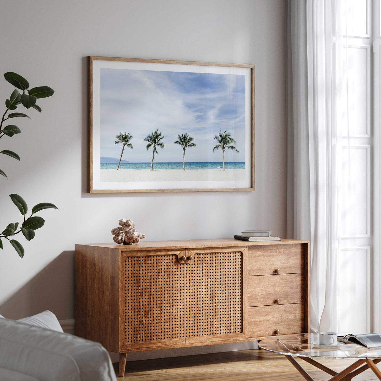 Tropical beach wall art print featuring tall palm trees and clear turquoise water for coastal inspired interiors.