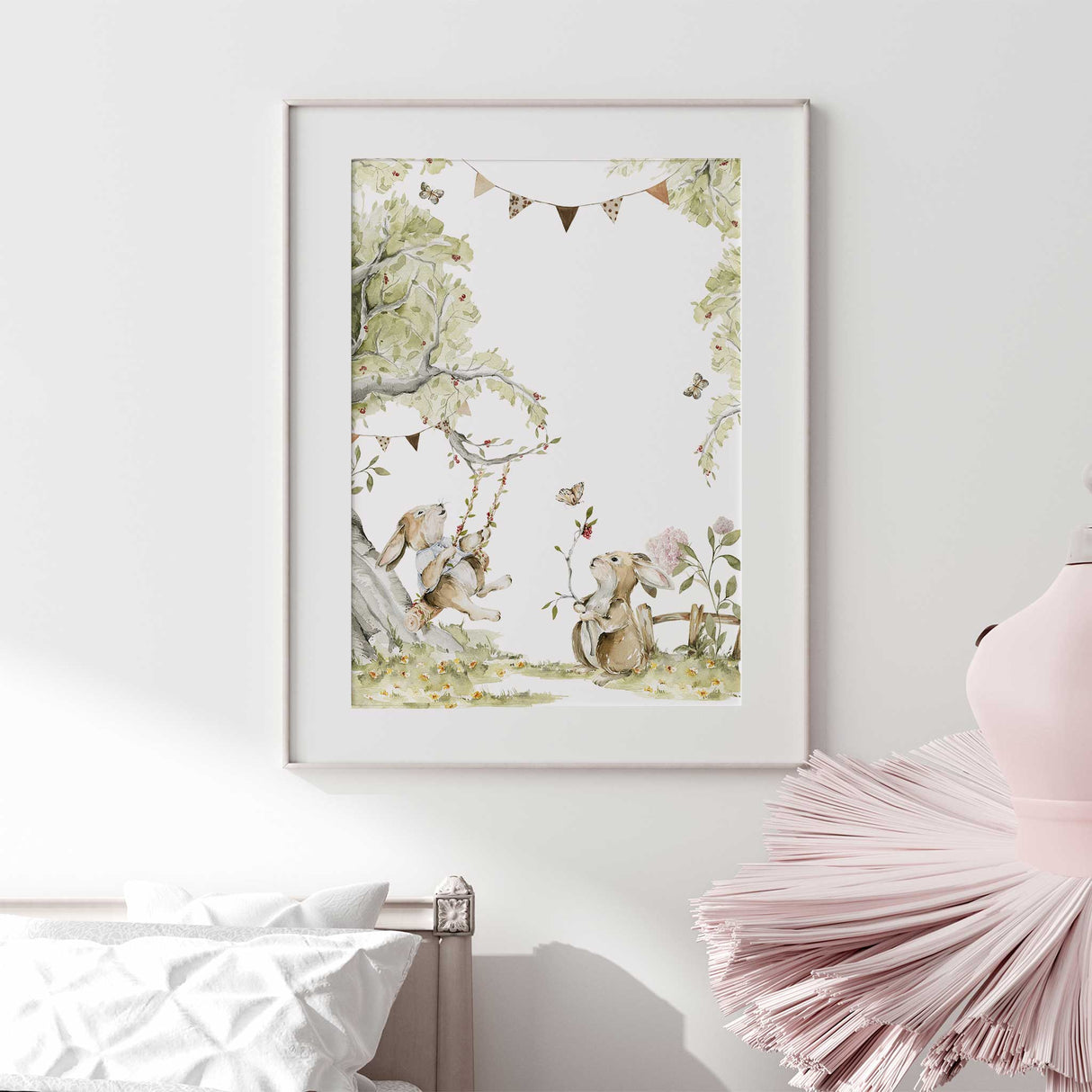 Watercolour illustration of two rabbits in a garden with green trees.