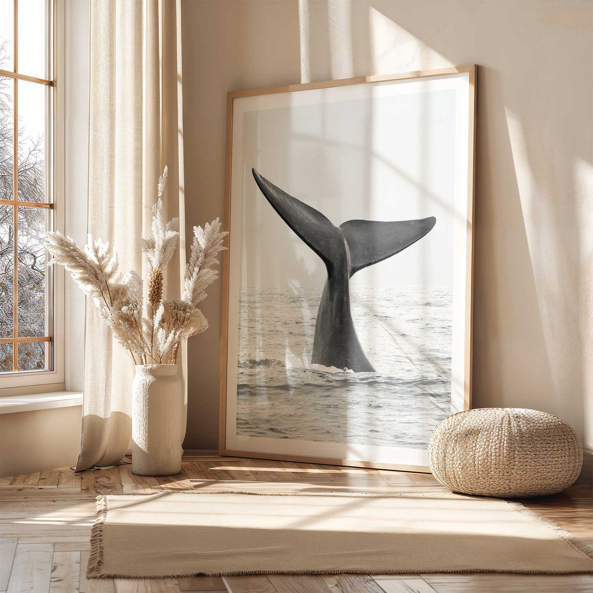whale tail wall art print styled in a modern coastal living room