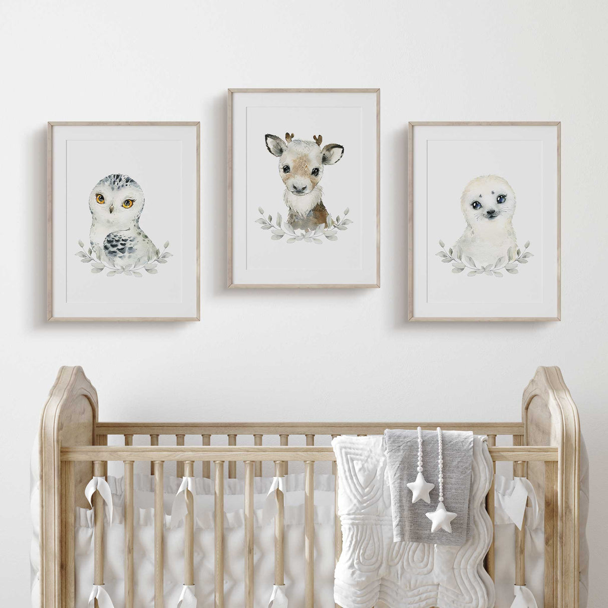 Winter animal nursery wall art for baby room with soft watercolor animals
