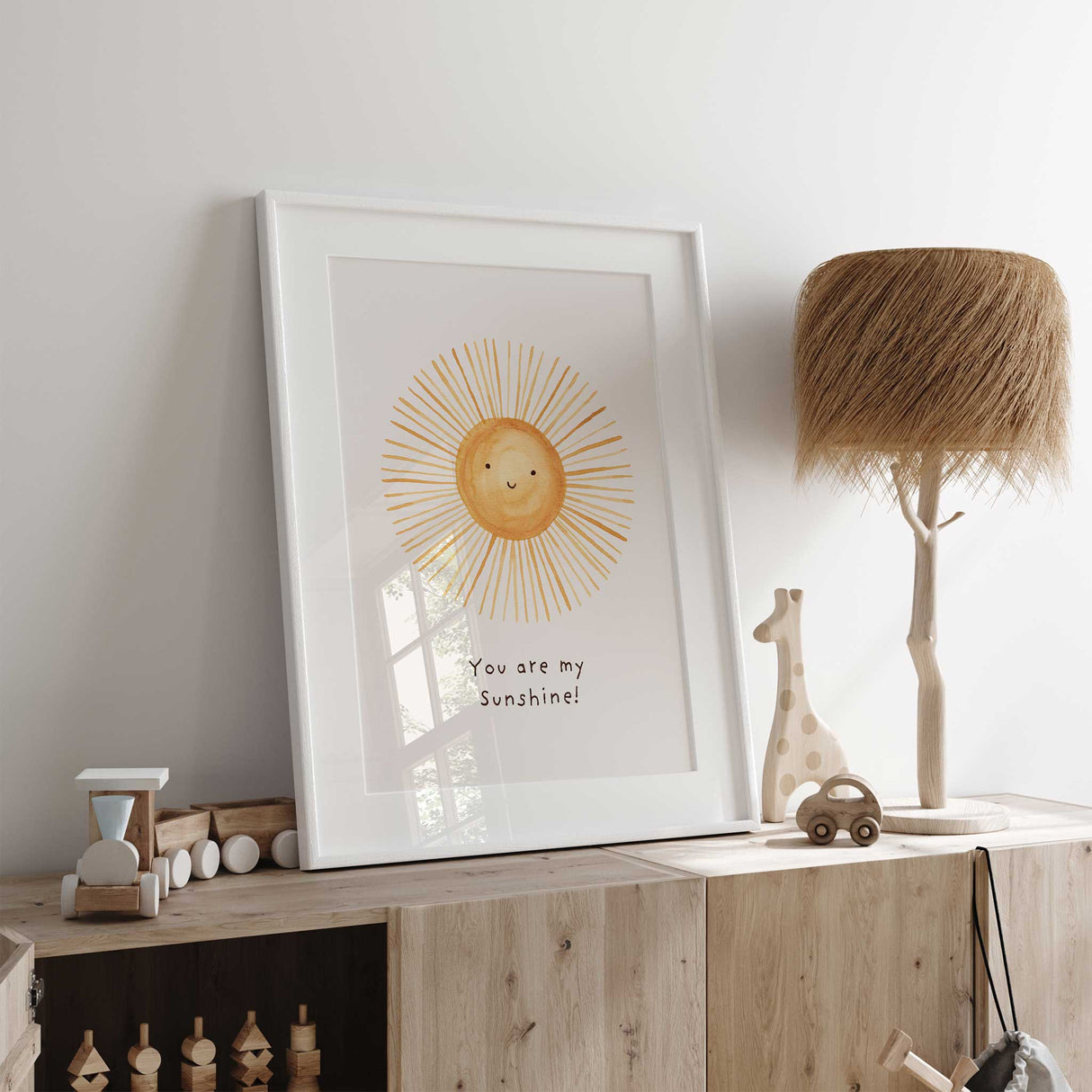 Watercolour sunshine wall art with 'You Are My Sunshine' quote for kids' room.