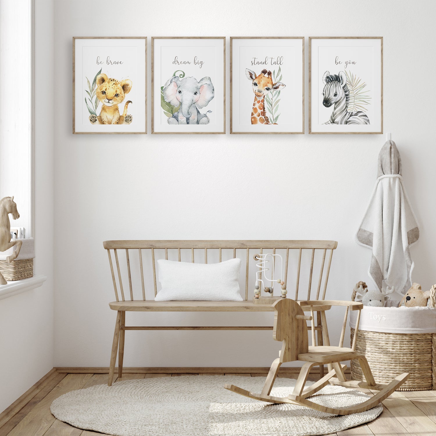 Safari baby room prints with lion cub, elephant, zebra, and giraffe illustrations in neutral tones for modern nursery walls.