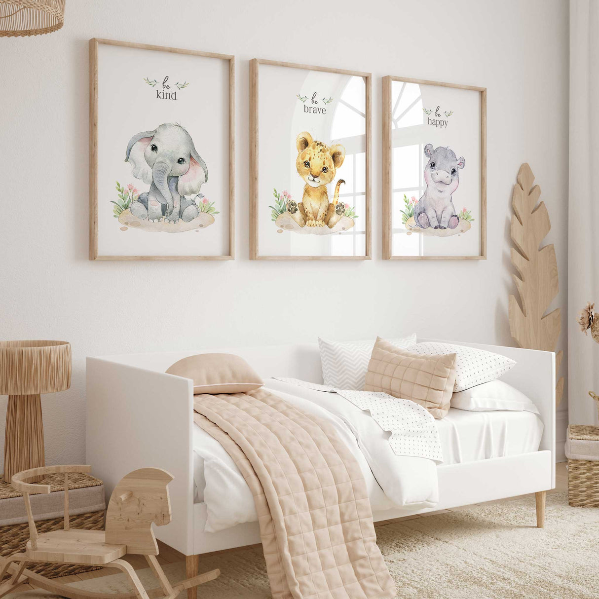 Safari nursery prints with pink florals and gentle animal illustrations