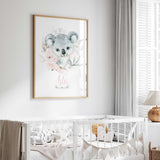 Floral koala name print in pink script beneath a grey watercolour koala with pink flowers and leaves.