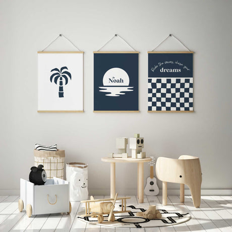 Set of minimalist nursery wall art featuring customizable name print, tropical palm design, and motivational checkered print for kids bedrooms
