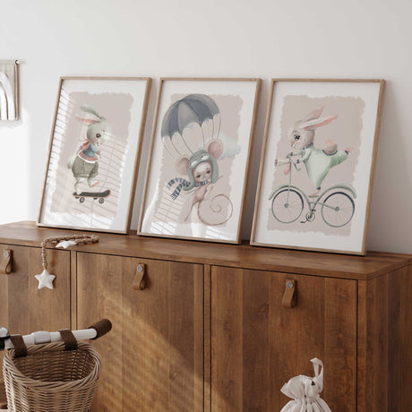 Animal adventure prints featuring two dressed bunnies and a parachuting mouse, with beige panels and soft pastel details.