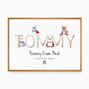 A wall art print with personalised name in a stylized font, accompanied by illustrations of an animal wearing a superhero costume and a fox with glasses.