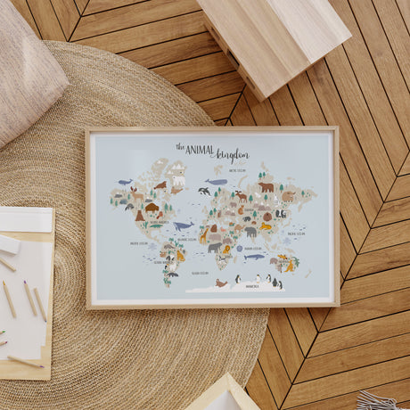 Animal world map wall art for kids showing illustrated animals across each continent