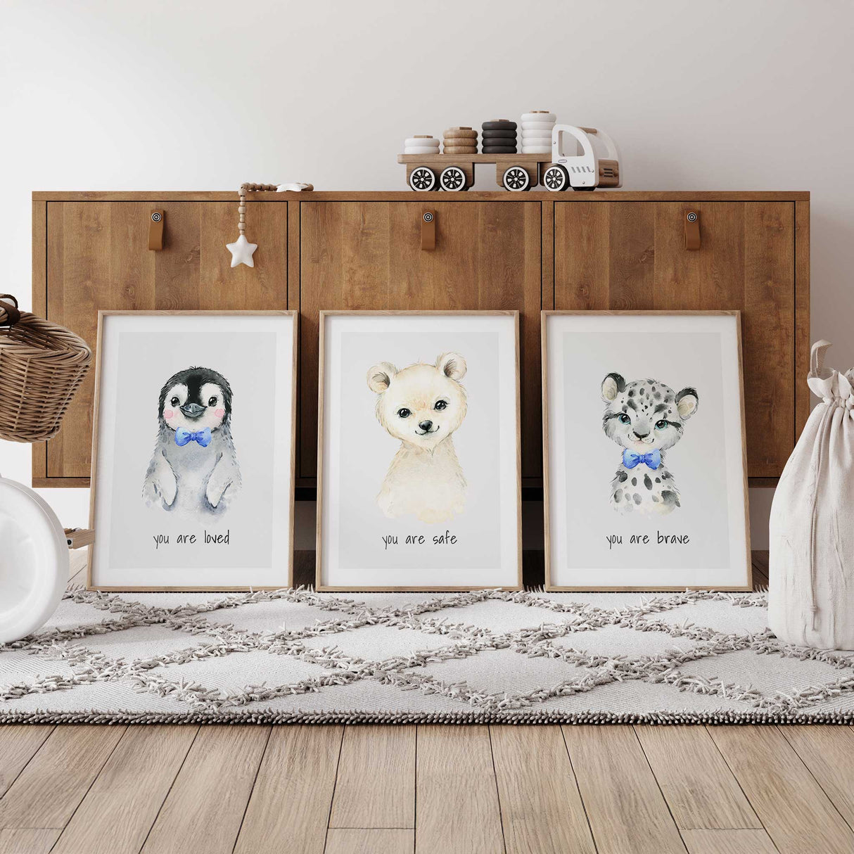 Set of three arctic baby animal nursery prints in soft neutral colours for boys