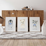 Set of three arctic baby animal nursery prints in soft neutral colours for boys