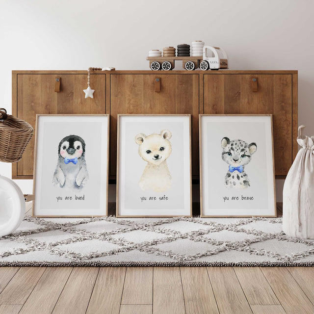 Set of three arctic baby animal nursery prints in soft neutral colours for boys